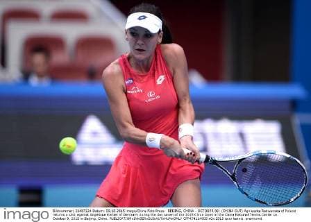 BEIJING, CHINA - OCTOBER 09: (CHINA OUT) Agnieszka Radwanska of Poland returns a shot against Angelique Kerber of Germany during the day seven of the 2015 China Open at the China National Tennis Center on October 9, 2015 in Beijing, China.  CFP474114005 