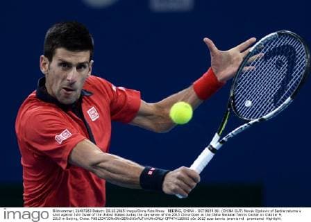 BEIJING, CHINA - OCTOBER 09: (CHINA OUT) Novak Djokovic of Serbia returns a shot against John Isner of the United States during the day seven of the 2015 China Open at the China National Tennis Center on October 9, 2015 in Beijing, China.  CFP474116865 