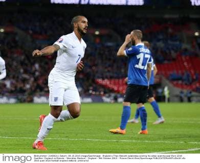 England s Theo Walcott celebrates scoring his sides opening goal Euro 2016 Qualifier- England vs Estonia - Wembley Stadium - England - 9th October 2015 - Picture David Klein Sportimage EDITORIAL USE ONLY. No use with unauthorised audio, video, data, fixture lists, club league logos or live services. Online in-match use limited to 120 images, no video emulation. No use in betting, games or single club league player publications.