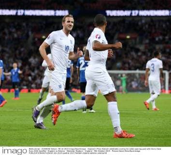England s Theo Walcott celebrates scoring his sides opening goal with Harry Kane Euro 2016 Qualifier- England vs Estonia - Wembley Stadium - England - 9th October 2015 - Picture David Klein Sportimage EDITORIAL USE ONLY. No use with unauthorised audio, video, data, fixture lists, club league logos or live services. Online in-match use limited to 120 images, no video emulation. No use in betting, games or single club league player publications.