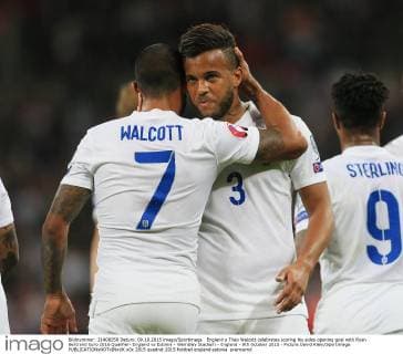 England s Theo Walcott celebrates scoring his sides opening goal with Ryan Bertrand Euro 2016 Qualifier- England vs Estonia - Wembley Stadium - England - 9th October 2015 - Picture David Klein Sportimage EDITORIAL USE ONLY. No use with unauthorised audio, video, data, fixture lists, club league logos or live services. Online in-match use limited to 120 images, no video emulation. No use in betting, games or single club league player publications.