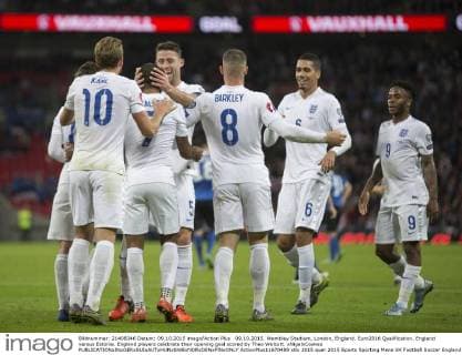09.10.2015. Wembley Stadium, London, England. Euro2016 Qualification. England versus Estonia. England players celebrate their opening goal scored by Theo Walcott. xNigelxCookex  ActionPlus11670489