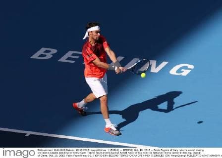 (151010) -- BEIJING, Oct. 10, 2015 -- Fabio Fognini of Italy returns a shot during the men s singles semifinal of China Open Tennis Tournament against Rafael Nadal of Spain at the National Tennis Center in Beijing, capital of China, Oct. 10, 2015. Fabio Fognini lost 0-2. ) (SP)CHINA-BEIJING-TENNIS-CHINA OPEN-MEN S SINGLES (CN) XingxGuangli 