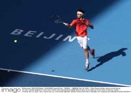(151010) -- BEIJING, Oct. 10, 2015 -- Fabio Fognini of Italy returns a shot during the men s singles semifinal of China Open Tennis Tournament against Rafael Nadal of Spain at the National Tennis Center in Beijing, capital of China, Oct. 10, 2015. Fabio Fognini lost 0-2. ) (SP)CHINA-BEIJING-TENNIS-CHINA OPEN-MEN S SINGLES (CN) XingxGuangli 
