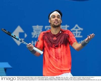 (151010) -- BEIJING, Oct. 10, 2015 -- Fabio Fognini of Italy reacts during the men s singles semifinal of China Open Tennis Tournament against Rafael Nadal of Spain at the National Tennis Center in Beijing, capital of China, Oct. 10, 2015. Fabio Fognini lost 0-2. ) (SP)CHINA-BEIJING-TENNIS-CHINA OPEN-MEN S SINGLES (CN) XingxGuangli 