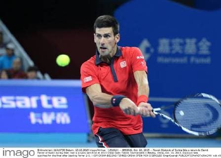 (151010) -- BEIJING, Oct. 10, 2015 -- Novak Djokovic of Serbia hits a return to David Ferrer of Spain during their men s singles semifinal at 2015 China Open Tennis Tournament in Beijing, China, Oct. 10, 2015. Djokovic was qualified for the final after beating Ferrer 2-0. ) (SP)CHINA-BEIJING-TENNIS-CHINA OPEN-MEN S SINGLES XingxGuangli 