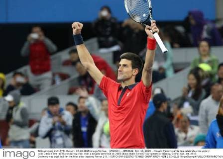 (151010) -- BEIJING, Oct. 10, 2015 -- Novak Djokovic of Serbia celebrates his victory over David Ferrer of Spain during their men s singles semifinal at 2015 China Open Tennis Tournament in Beijing, China, Oct. 10, 2015. Djokovic was qualified for the final after beating Ferrer 2-0. ) (SP)CHINA-BEIJING-TENNIS-CHINA OPEN-MEN S SINGLES XingxGuangli 