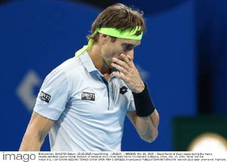 (151010) -- BEIJING, Oct. 10, 2015 -- David Ferrer of Spain reacts during the men s singles semifinal against Novak Djokovic of Serbia at 2015 China Open Tennis Tournament in Beijing, China, Oct. 10, 2015. Ferrer lost the match 0-2. ) (SP)CHINA-BEIJING-TENNIS-CHINA OPEN-MEN S SINGLES XingxGuangli 
