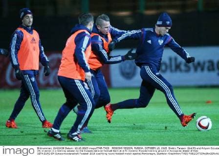 MOSCOW REGION, RUSSIA. OCTOBER 10, 2015. Dmitry Tarasov (2nd R) and Artyom Dzyuba (R) in action in a training session by the Russian national football team at a FC Dynamo Moscow training ground in Novogorsk ahead of their UEFA EURO EM Europameisterschaft Fussball 2016 qualifying round football match against Montenegro. Stanislav Krasilnikov TASS  TS00F885