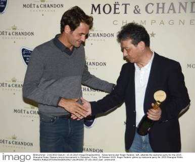 Swiss tennis star Roger Federer, left, attends the welcome party for the 2015 Shanghai Rolex Masters tennis tournament in Shanghai, China, 10 October 2015. Roger Federer glams up welcome party for 2015 Shanghai Rolex Masters  pbu343202_07