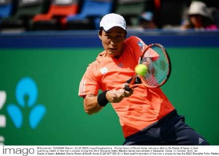 Chung Hyeon of South Korea returns a shot to Go Soeda of Japan in their qualifying match of the men s singles during the 2015 Shanghai Rolex Masters tennis tournament in Shanghai, China, 11 October 2015. Go Soeda of Japan defeated Chung Hyeon of South Korea 2-1(0-6 7-5 6-3) in their qualifying match of the men s singles during the 2015 Shanghai Rolex Masters tennis tournament in Shanghai, China, on Sunday (11 October 2015). Go Soeda defeats Chung Hyeon at Shanghai Rolex Masters  20151011_61848