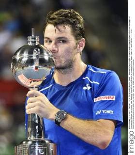 Wawrinka beats Paire to take Japan Open singles title Stan Wawrinka of Switzerland kisses the trophy after beating Benoit Paire of France in the final of the Japan Open in Tokyo on Oct. 11, 2015. 