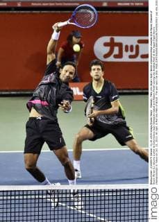 Klaasen, Melo win Japan Open tennis championships doubles title Raven Klaasen of South Africa (L) returns a shot to Colombians Juan Sebastian Cabal and Robert Farah during the doubles final at the Japan Open tennis championships in Tokyo on Oct. 11, 2015. At right is Marcelo Melo of Brazil. The pair won the title. 
