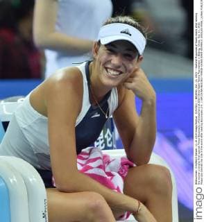 (151011) -- BEIJING, Oct. 11, 2015 -- Garbine Muguruza of Spain reacts after winning the women s singles final against Timea Bacsinszky of Switzerland at 2015 China Open Tennis Tournament in Beijing, China, Oct. 11, 2015. Muguruza claimed the title of the event after beating Bacsinszky 2-0. ) (SP)CHINA-BEIJING-TENNIS-CHINA OPEN-WOMEN S SINGLES-FINAL LixWen 