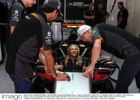 Russian Grand Prix, Sochi 08 - 11 October 2015 11.10.2015 - Darya Klishina (RUS) Long Jump Athlete with Sergio Perez (MEX) Sahara Force India F1 VJM08 and Nico Hulkenberg (GER) Sahara Force India F1 VJM08 