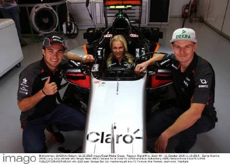 Russian Grand Prix, Sochi 08 - 11 October 2015 11.10.2015 - Darya Klishina (RUS) Long Jump Athlete with Sergio Perez (MEX) Sahara Force India F1 VJM08 and Nico Hulkenberg (GER) Sahara Force India F1 VJM08 