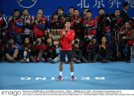 (151011) -- BEIJING, Oct. 11, 2015 -- Novak Djokovic of Serbia poses with his champion trophy during the awarding ceremony for the men s singles final at 2015 China Open Tennis Tournament in Beijing, China, Oct. 11, 2015. Djokovic claimed the title of the event after beating Rafael Nadal of Spain 2-0. ) (SP)CHINA-BEIJING-TENNIS-CHINA OPEN-MEN S SINGLES-FINAL XingxGuangli 