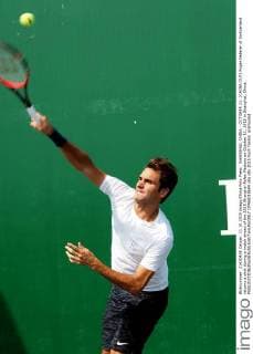 SHANGHAI, CHINA - OCTOBER 11: (CHINA OUT) Roger Federer of Switzerland returns a shot during a match ahead of the 2015 Shanghai Rolex Masters on October 11, 2015 in Shanghai, China.  CFP66018604 