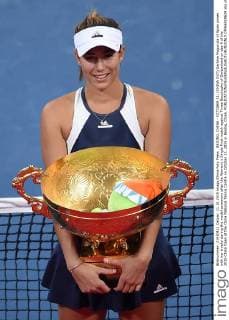 BEIJING, CHINA - OCTOBER 11: (CHINA OUT) Garbine Muguruza of Spain poses with her trophy during the medal ceremony after the Women s Single Final match against Timea Bacsinszky of Switzerland on day 9 of the 2015 China Open at the China National Tennis Centre on October 11, 2015 in Beijing, China.  CFP66018624 