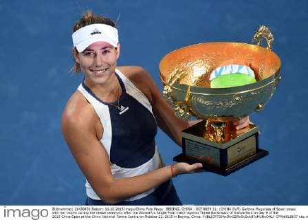 BEIJING, CHINA - OCTOBER 11: (CHINA OUT) Garbine Muguruza of Spain poses with her trophy during the medal ceremony after the Women s Single Final match against Timea Bacsinszky of Switzerland on day 9 of the 2015 China Open at the China National Tennis Centre on October 11, 2015 in Beijing, China.  CFP66018637 