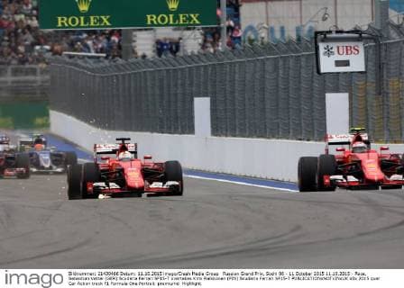 Russian Grand Prix, Sochi 08 - 11 October 2015 11.10.2015 - Race, Sebastian Vettel (GER) Scuderia Ferrari SF15-T overtakes Kimi Raikkonen (FIN) Scuderia Ferrari SF15-T 