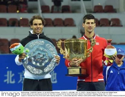 (151011) -- BEIJING, Oct. 11, 2015 -- Novak Djokovic (R) of Serbia and Rafael Nadal of Spain attend the awarding ceremony for the men s singles final at 2015 China Open Tennis Tournament in Beijing, China, Oct. 11, 2015. Djokovic claimed the title of the event after beating Nadal 2-0. ) (SP)CHINA-BEIJING-TENNIS-CHINA OPEN-MEN S SINGLES-FINAL LixWen 