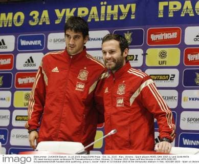 Oct. 11, 2015 - Kiev, Ukraine - Spain players MIKEL SAN JOSE (L) and JUAN MATA (R) react during a press conference PK Pressekonferenz in Kiev, Ukraine, 11 October 2015. Spain will face Ukraine in the UEFA EURO EM Europameisterschaft Fussball 2016 qualifying, group C, soccer match on 12 October 2015 at the Olimpiyskyi stadium in Kiev. SOCCER 2015 - Spain vs Ukraine,UEFA EURO 2016 QUALIFICATION - ZUMAg194