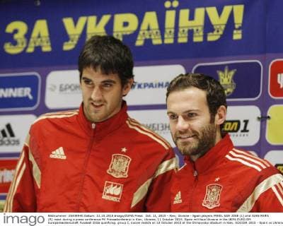 Oct. 11, 2015 - Kiev, Ukraine - Spain players MIKEL SAN JOSE (L) and JUAN MATA (R) react during a press conference PK Pressekonferenz in Kiev, Ukraine, 11 October 2015. Spain will face Ukraine in the UEFA EURO EM Europameisterschaft Fussball 2016 qualifying, group C, soccer match on 12 October 2015 at the Olimpiyskyi stadium in Kiev. SOCCER 2015 - Spain vs Ukraine,UEFA EURO 2016 QUALIFICATION - ZUMAg194