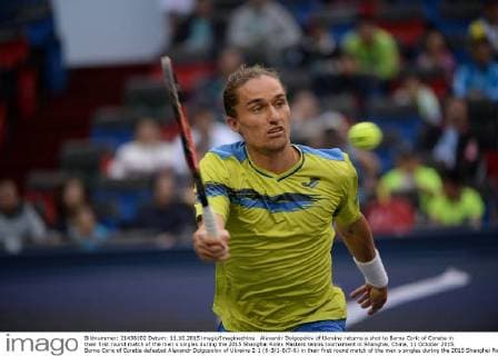 Alexandr Dolgopolov of Ukraine returns a shot to Borna Coric of Coratia in their first round match of the men s singles during the 2015 Shanghai Rolex Masters tennis tournament in Shanghai, China, 11 October 2015. Borna Coric of Coratia defeated Alexandr Dolgopolov of Ukraine 2-1 (6-3 1-6 7-6) in their first round match of the men s singles during the 2015 Shanghai Rolex Masters tennis tournament in Shanghai, China, 11 October 2015. Borna Coric kicks out Alexandr Dolgopolov at Shanghai Rolex Masters  20151011_32136