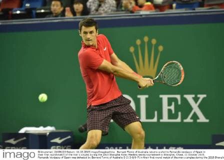 Bernard Tomic of Australia returns a shot to Fernando Verdasco of Spain in their first round match of the men s singles during the 2015 Shanghai Rolex Masters tennis tournament in Shanghai, China, 11 October 2015. Fernando Verdasco of Spain was defeated by Bernard Tomic of Australia 0-2 (3-6 6-7) in their first round match of the men s singles during the 2015 Shanghai Rolex Masters tennis tournament in Shanghai, China, 11 October 2015. Fernando Verdasco ousted by Bernard Tomic at Shanghai Rolex Masters  20151011_64615