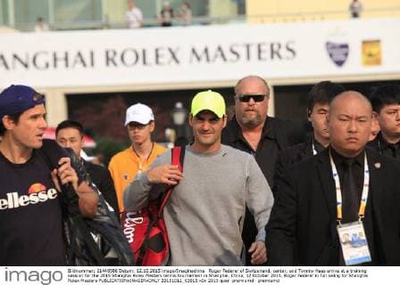Roger Federer of Switzerland, center, and Tommy Haas arrive at a training session for the 2015 Shanghai Rolex Masters tennis tournament in Shanghai, China, 12 October 2015. Roger Federer in full swing for Shanghai Rolex Masters  20151012_63915