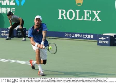 Andreas Haider-Maurer of Austria returns a shot to Nick Kyrgios of Australia in their first round match of the men s singles during the 2015 Shanghai Rolex Masters tennis tournament in Shanghai, China, 12 October 2015. Nick Kyrgios of Australia defeated Andreas Haider-Maurer of Austria 2-0 (6-3 6-2) in their first round match of the men s singles during the 2015 Shanghai Rolex Masters tennis tournament in Shanghai, China, 12 October 2015. Nick Kyrgios knocks out Andreas Haider-Maurer at Shanghai Rolex Masters  20151012_32434