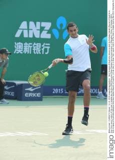 Nick Kyrgios of Australia returns a shot to Andreas Haider-Maurer of Austria in their first round match of the men s singles during the 2015 Shanghai Rolex Masters tennis tournament in Shanghai, China, 12 October 2015. Nick Kyrgios of Australia defeated Andreas Haider-Maurer of Austria 2-0 (6-3 6-2) in their first round match of the men s singles during the 2015 Shanghai Rolex Masters tennis tournament in Shanghai, China, 12 October 2015. Nick Kyrgios knocks out Andreas Haider-Maurer at Shanghai Rolex Masters  20151012_09976