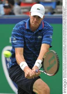 John Isner of the United States returns a shot to Adrian Mannarino of France in their first round match of the men s singles during the 2015 Shanghai Rolex Masters tennis tournament in Shanghai, China, 12 October 2015. John Isner of the United States defeated Adrian Mannarino of France 2-0 (6-1 6-2) in their first round match of the men s singles during the 2015 Shanghai Rolex Masters tennis tournament in Shanghai, China, 12 October 2015. Nick Kyrgios knocks out Andreas Haider-Maurer at Shanghai Rolex Masters  pbu344019_15