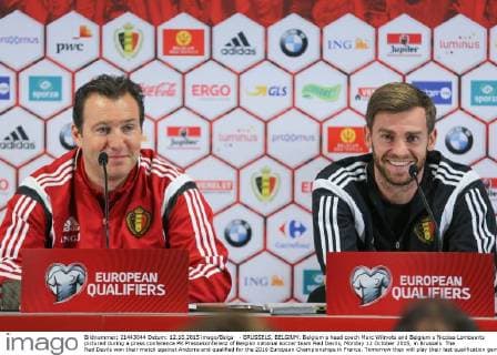 - BRUSSELS, BELGIUM: Belgium s head coach Marc Wilmots and Belgium s Nicolas Lombaerts pictured during a press conference PK Pressekonferenz of Belgian national soccer team Red Devils, Monday 12 October 2015, in Brussels. The Red Devils won their match against Andorra and qualified for the 2016 European Championships in France. Tomorrow they will play their last qualification game against Israel in Brussels. BRUNOxFAHY  x04719185x