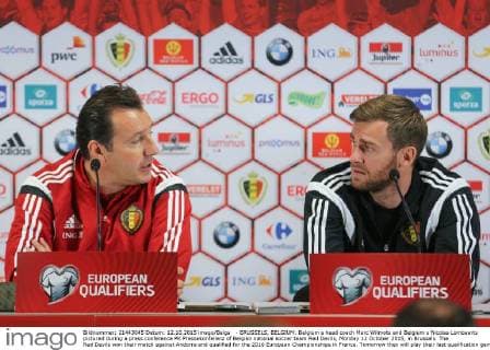 - BRUSSELS, BELGIUM: Belgium s head coach Marc Wilmots and Belgium s Nicolas Lombaerts pictured during a press conference PK Pressekonferenz of Belgian national soccer team Red Devils, Monday 12 October 2015, in Brussels. The Red Devils won their match against Andorra and qualified for the 2016 European Championships in France. Tomorrow they will play their last qualification game against Israel in Brussels. BRUNOxFAHY  x04719188x
