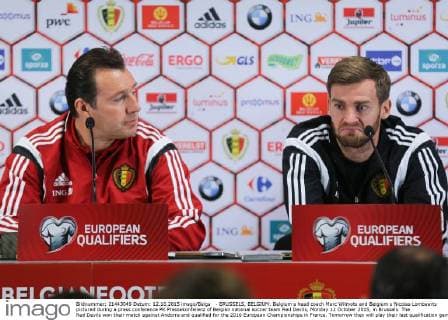 - BRUSSELS, BELGIUM: Belgium s head coach Marc Wilmots and Belgium s Nicolas Lombaerts pictured during a press conference PK Pressekonferenz of Belgian national soccer team Red Devils, Monday 12 October 2015, in Brussels. The Red Devils won their match against Andorra and qualified for the 2016 European Championships in France. Tomorrow they will play their last qualification game against Israel in Brussels. BRUNOxFAHY  x04719186x