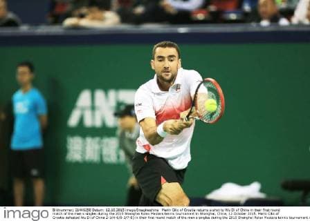 Marin Cilic of Croatia returns a shot to Wu Di of China in their first round match of the men s singles during the 2015 Shanghai Rolex Masters tennis tournament in Shanghai, China, 12 October 2015. Marin Cilic of Croatia defeated Wu Di of China 2-1(4-6 6-3 7-6) in their first round match of the men s singles during the 2015 Shanghai Rolex Masters tennis tournament in Shanghai, China, 12 October 2015. Marin Cilic kicks out Wu Di at Shanghai Rolex Masters  20151012_35056