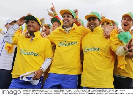 Oct. 11, 2015 - Incheon, South Korea - October 11, 2015 - South Korea, Incheon : International Team player Thongchai Jaidee, Charl Schwartzel, Anirban Lahiri take a picture with cheer fans after match finished on the 18th green during the PGA Golf Herren Tour President Cup Single Match at Jack Nicklaus GC in Incheon, South Korea. PGA Presidents Cup  - ZUMAn230