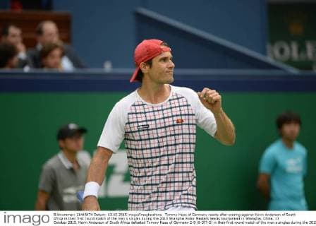 Tommy Haas of Germany reacts after scoring against Kevin Anderson of South Africa in their first round match of the men s singles during the 2015 Shanghai Rolex Masters tennis tournament in Shanghai, China, 13 October 2015. Kevin Anderson of South Africa defeated Tommy Haas of Germany 2-0 (6-3 7-5) in their first round match of the men s singles during the 2015 Shanghai Rolex Masters tennis tournament in Shanghai, China, 13 October 2015. Kevin Anderson defeats Tommy Haas at Shanghai Rolex Masters  20151013_11196