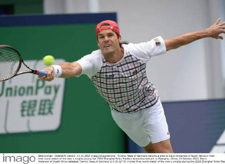 Tommy Haas of Germany returns a shot to Kevin Anderson of South Africa in their first round match of the men s singles during the 2015 Shanghai Rolex Masters tennis tournament in Shanghai, China, 13 October 2015. Kevin Anderson of South Africa defeated Tommy Haas of Germany 2-0 (6-3 7-5) in their first round match of the men s singles during the 2015 Shanghai Rolex Masters tennis tournament in Shanghai, China, 13 October 2015. Kevin Anderson defeats Tommy Haas at Shanghai Rolex Masters  20151013_33594