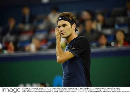 Roger Federer of Switzerland reacts in the second round match of the men s singles against Albert Ramos-Vinolas of Spain during the 2015 Shanghai Rolex Masters tennis tournament in Shanghai, China, 13 October 2015. Roger Federer of Switzerland was defeated by Albert Ramos-Vinolas of Spain 1-2 (6-7 6-2 3-6) in their second round match of the men s singles during the 2015 Shanghai Rolex Masters tennis tournament in Shanghai, China, 13 October 2015. Roger Federer kicked out by Albert Ramos-Vinolas at Shanghai Rolex Masters  20151013_35689