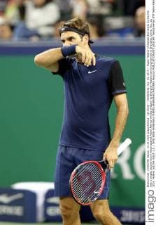 (151013) -- SHANGHAI, Oct. 13, 2015 -- Roger Federer of Switzerland reacts during the men s singles second round match against Albert Ramos-Vinolas of Spain at Shanghai Masters tennis tournament in Shanghai, China, Oct. 13, 2015. Federer lost the match 1-2. ) (SP)CHINA-SHANGHAI-TENNIS-SHANGHAI MASTERS FanxJun 