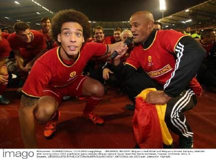 - BRUSSELS, BELGIUM: Belgium s Axel Witsel and Belgium s Vincent Kompany celebrate after winning a Euro 2016 qualification game between Belgian national soccer team Red Devils and Israel, Tuesday 13 October 2015, in Brussels. VIRGINIExLEFOUR  x04720362x