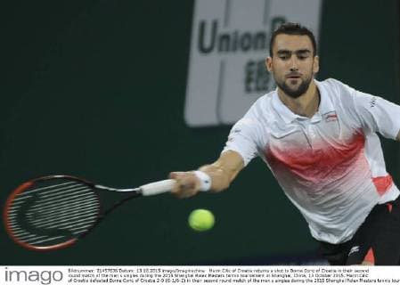 Marin Cilic of Croatia returns a shot to Borna Coric of Croatia in their second round match of the men s singles during the 2015 Shanghai Rolex Masters tennis tournament in Shanghai, China, 13 October 2015. Marin Cilic of Croatia defeated Borna Coric of Croatia 2-0 (6-1 6-2) in their second round match of the men s singles during the 2015 Shanghai Rolex Masters tennis tournament in Shanghai, China, 13 October 2015. Marin Cilic slashes Borna Coric at Shanghai Rolex Masters  pbu344646_11