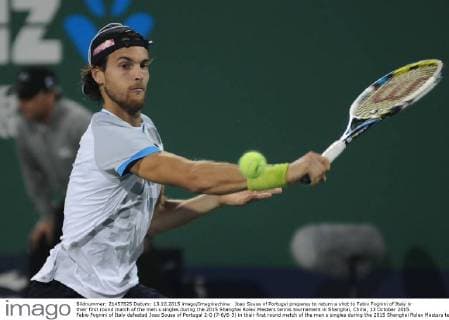 Joao Sousa of Portugal prepares to return a shot to Fabio Fognini of Italy in their first round match of the men s singles during the 2015 Shanghai Rolex Masters tennis tournament in Shanghai, China, 13 October 2015. Fabio Fognini of Italy defeated Joao Sousa of Portugal 2-0 (7-6 6-3) in their first round match of the men s singles during the 2015 Shanghai Rolex Masters tennis tournament in Shanghai, China, 13 October 2015. Fabio Fognini defeats Joao Sousa at Shanghai Rolex Masters  pbu344606_11