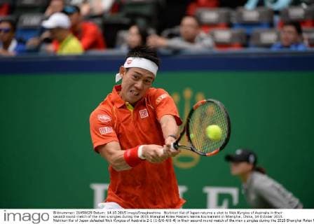 Nishikori Kei of Japan returns a shot to Nick Kyrgios of Australia in their second round match of the men s singles during the 2015 Shanghai Rolex Masters tennis tournament in Shanghai, China, 14 October 2015. Nishikori Kei of Japan defeated Nick Kyrgios of Australia 2-1 (1-6 6-4 6-4) in their second round match of the men s singles during the 2015 Shanghai Rolex Masters tennis tournament in Shanghai, China, 14 October 2015. Nishikori Kei ousts Nick Kyrgios at Shanghai Rolex Masters  20151014_63895