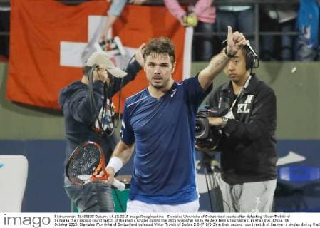 Stanislas Wawrinka of Switzerland reacts after defeating Viktor Troicki of Serbia in their second round match of the men s singles during the 2015 Shanghai Rolex Masters tennis tournament in Shanghai, China, 14 October 2015. Stanislas Wawrinka of Switzerland defeated Viktor Troicki of Serbia 2-0 (7-6 6-3) in their second round match of the men s singles during the 2015 Shanghai Rolex Masters tennis tournament in Shanghai, China, 14 October 2015. Stanislas Wawrinka knocks out Viktor Troicki at Shanghai Rolex Masters  20151014_50807