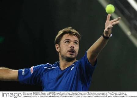 Stanislas Wawrinka of Switzerland serves against Viktor Troicki of Serbia in their second round match of the men s singles during the 2015 Shanghai Rolex Masters tennis tournament in Shanghai, China, 14 October 2015. Stanislas Wawrinka of Switzerland defeated Viktor Troicki of Serbia 2-0 (7-6 6-3) in their second round match of the men s singles during the 2015 Shanghai Rolex Masters tennis tournament in Shanghai, China, 14 October 2015. Stanislas Wawrinka knocks out Viktor Troicki at Shanghai Rolex Masters  pbu345165_13