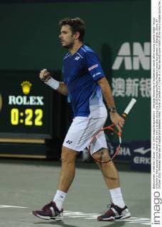 Stanislas Wawrinka of Switzerland reacts after scoring against Viktor Troicki of Serbia in their second round match of the men s singles during the 2015 Shanghai Rolex Masters tennis tournament in Shanghai, China, 14 October 2015. Stanislas Wawrinka of Switzerland defeated Viktor Troicki of Serbia 2-0 (7-6 6-3) in their second round match of the men s singles during the 2015 Shanghai Rolex Masters tennis tournament in Shanghai, China, 14 October 2015. Stanislas Wawrinka knocks out Viktor Troicki at Shanghai Rolex Masters  pbu345164_18